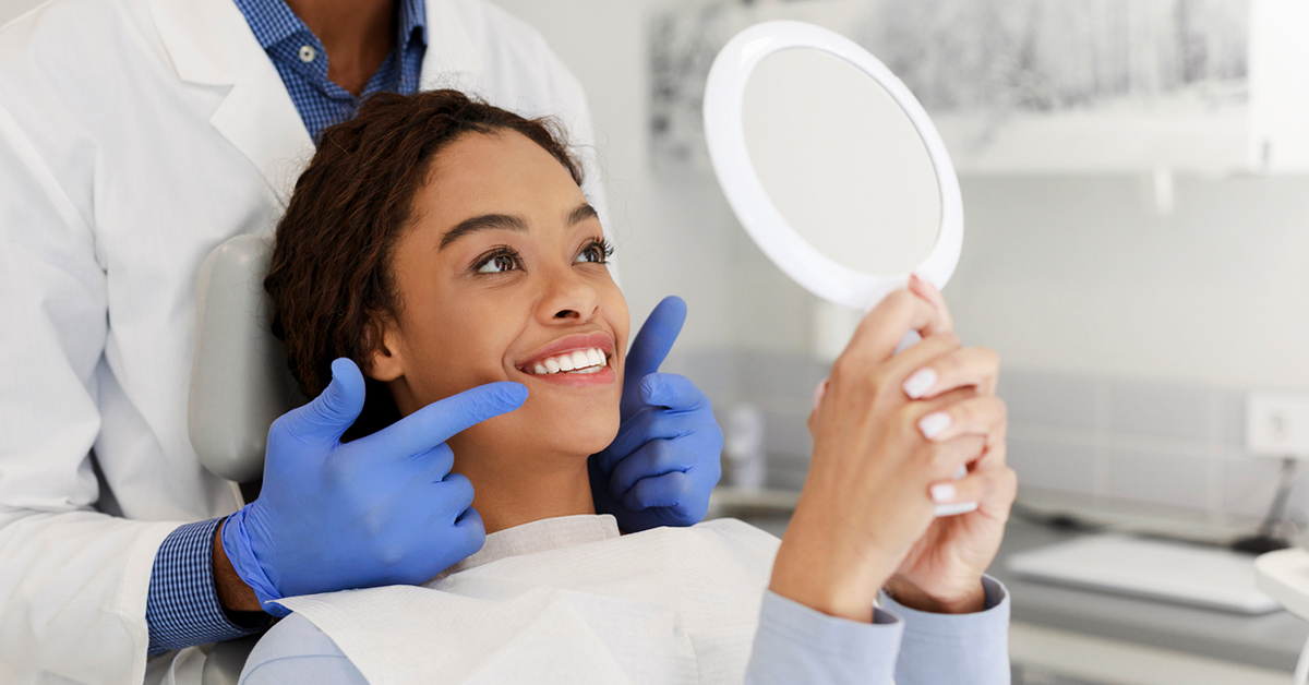 Woman getting smile checked